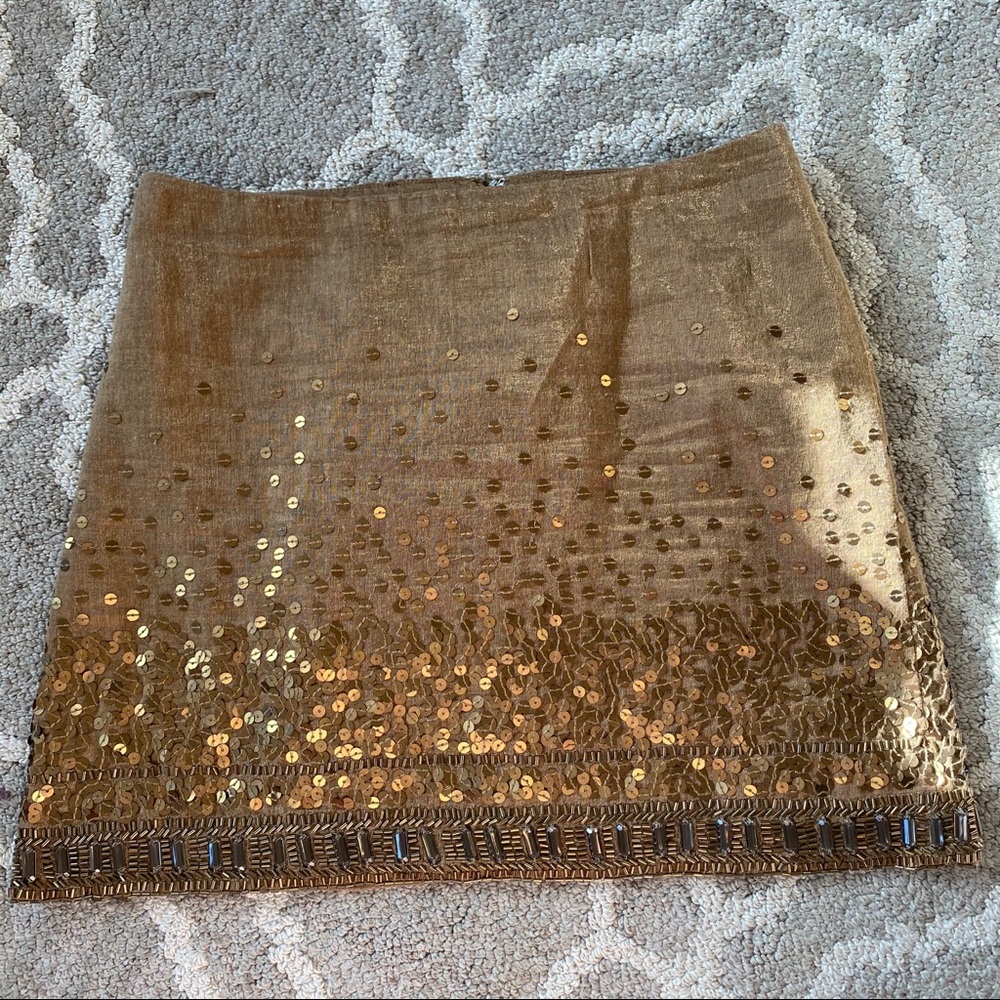 Jennifer Lopez gold sequined skirt